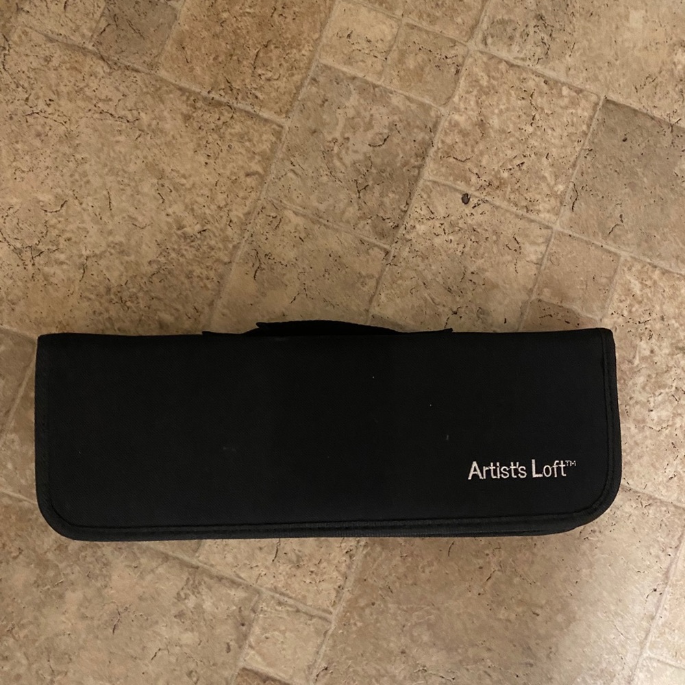 Artist’s loft case with markers